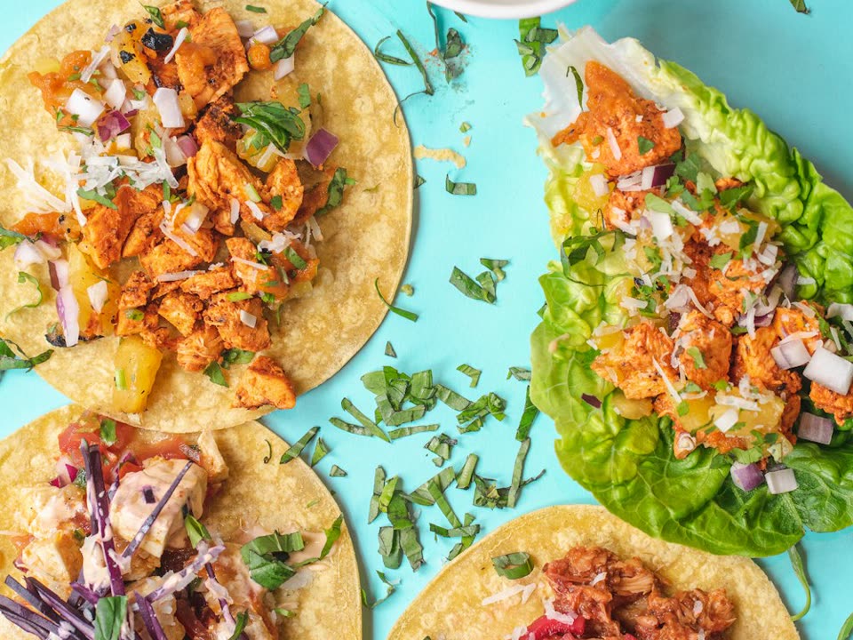 Citrus-cumin chicken tacos with pickled red onion