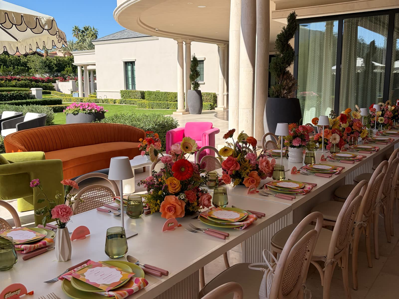 A patio dining table set for a private event