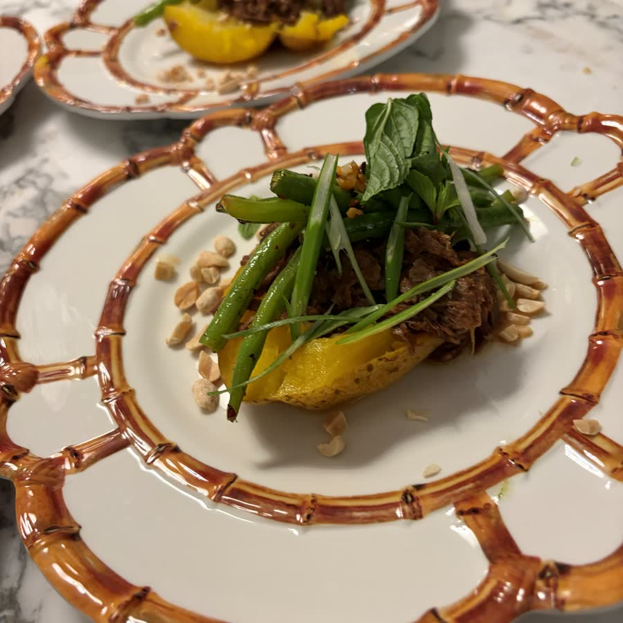 Plated stuffed pepper with green beans