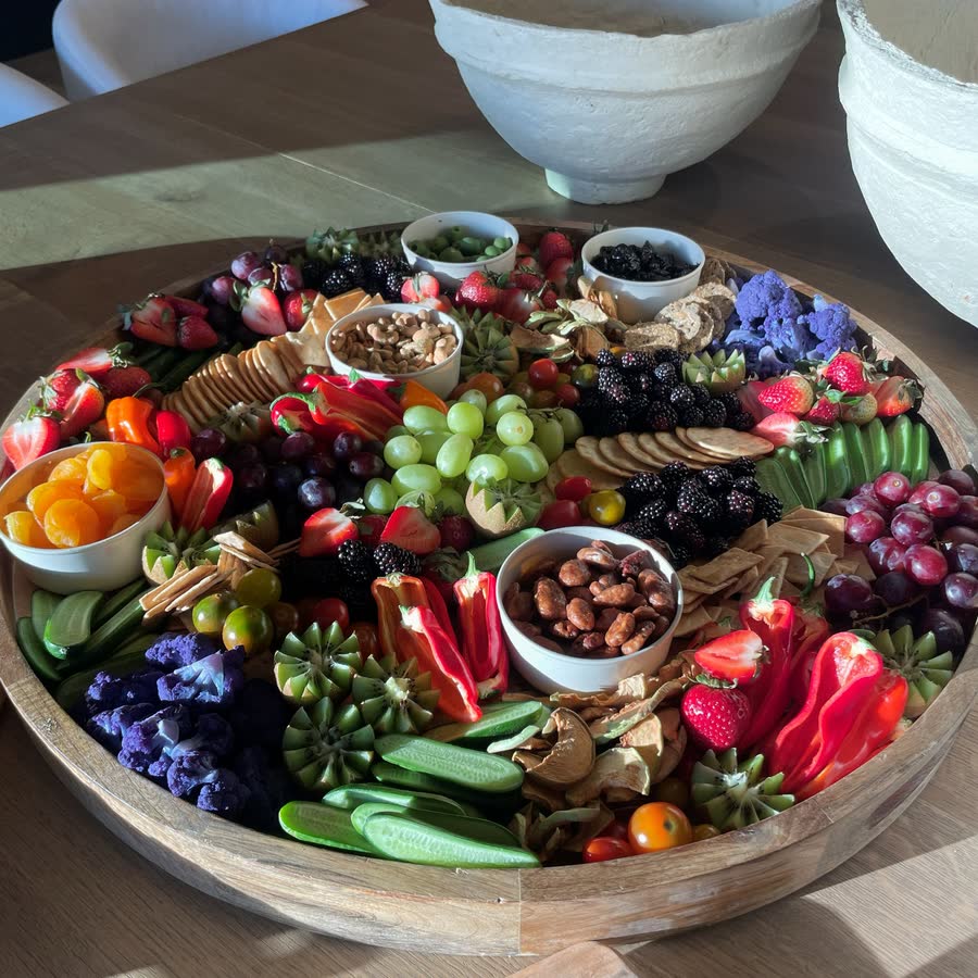 Grazing board with fruit, cheese and vegetables