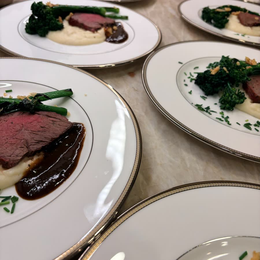 Plated beef with whipped potatoes and broccolini