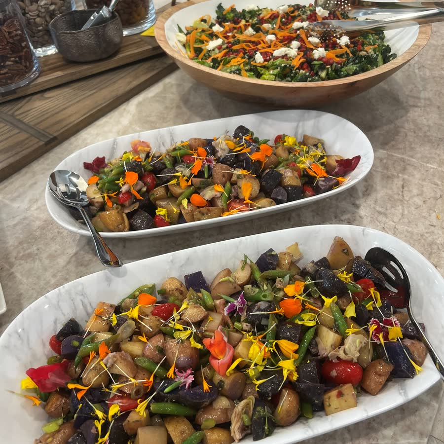 Roasted vegetable platter with edible flowers