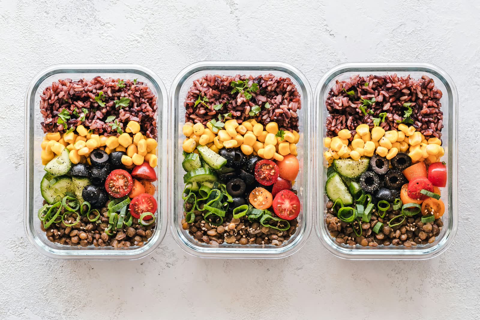 Meals portioned into glass containers for the week